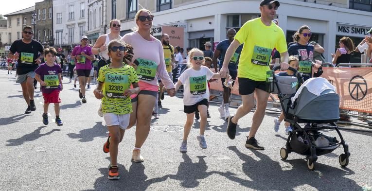 Families running together for The Big Mile race