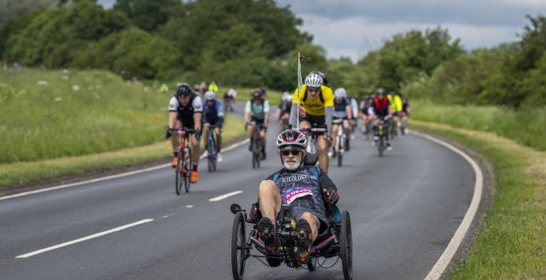 Man cycling an adaptive bike in the RideLondon event