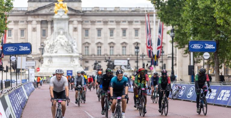 Cyclists cycling up The Mall for the RideLondon event