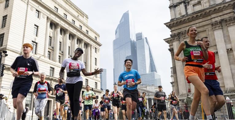 a low shot of group of happy runners