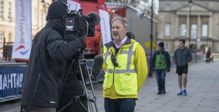 Marathon official being interviewed