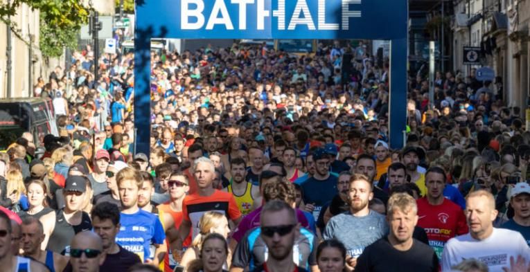 Runners flooding the streets of bath.