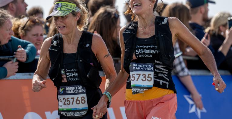 two women running