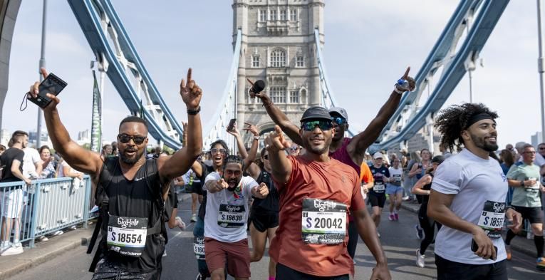 Big Half runners pose on Tower Bridge