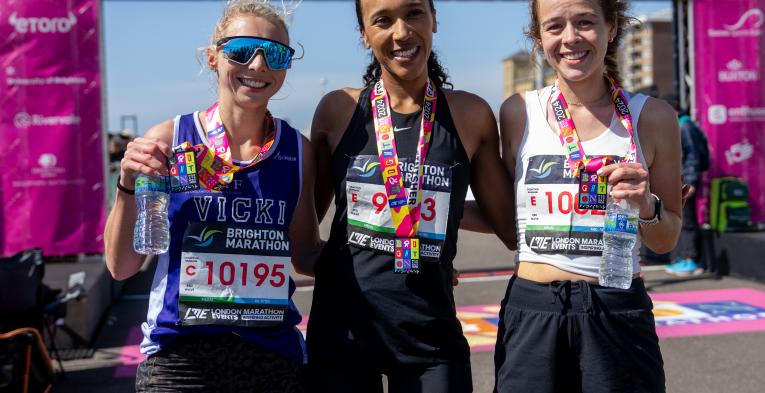 Three women with medals