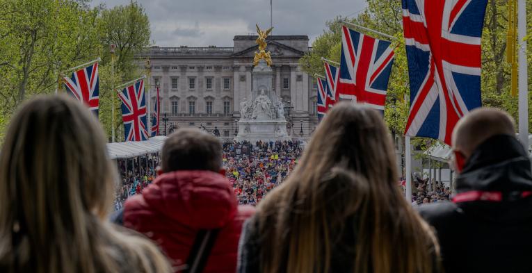 Spectators overlooking the finishers at the TCS London Marathon on the Mall