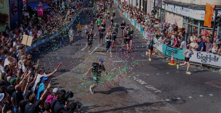 A areal view of confetti canons going off over the course