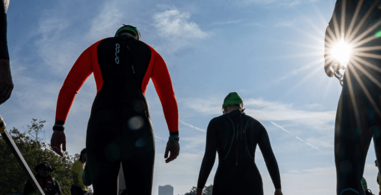 swimmers entering the serpentine