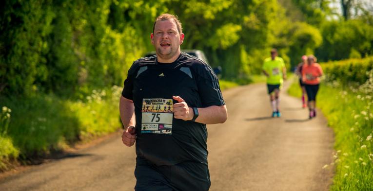 Running man takes part in half marathon