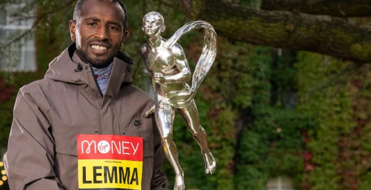 Sisay Lemma (ETH) poses with the Sporting Life Chris Brasher Trophy after winning the Elite Men’s Race at the 2021 TCS London Marathon