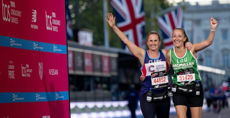 Two women at the Finish Line of the TCS London Marathon