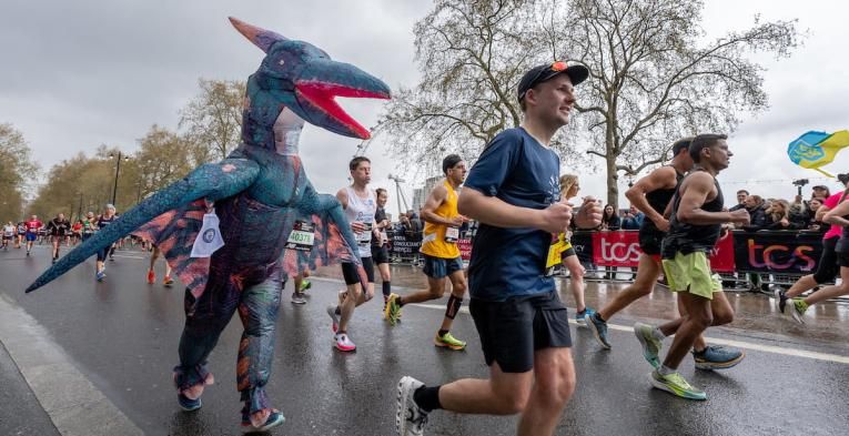 A TCS London Marathon participant dressed as a dinosaur