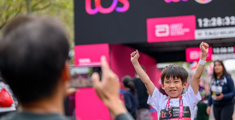 A participant after finishing the TCS Mini London Marathon