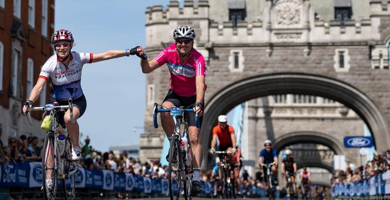 Participants cross Tower Bridge