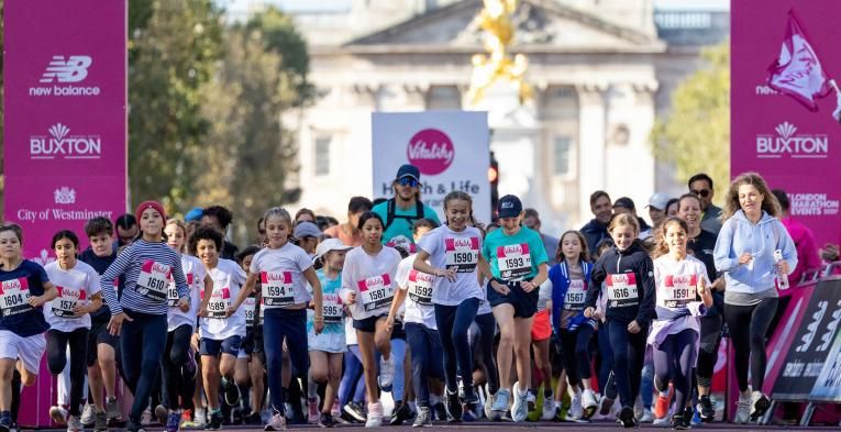 Young runners leave the 2023 Vitality Westminster Mile Start Line