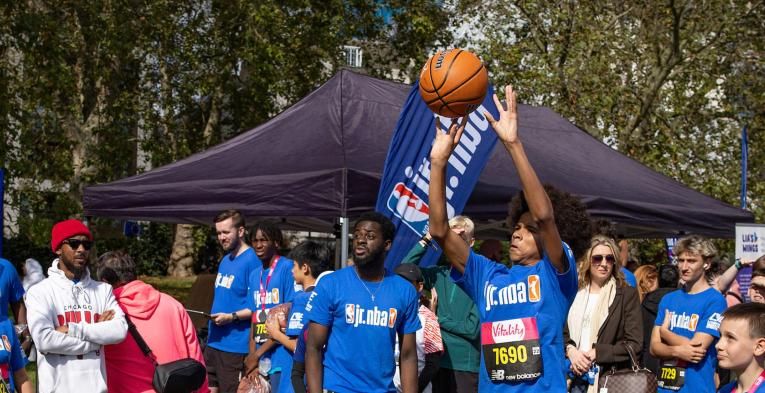 Child shooting a basketball