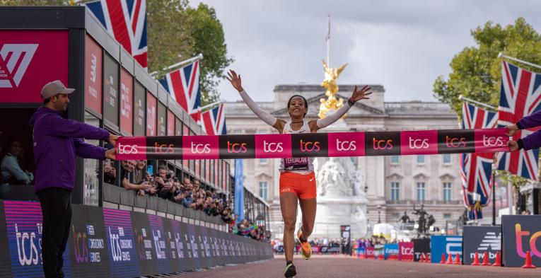 Yalemzerf Yehualaw cross the Finish Line of the 2022 TCS London Marathon