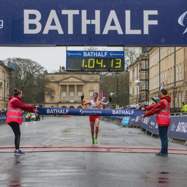 Man coming first in the Bath Half