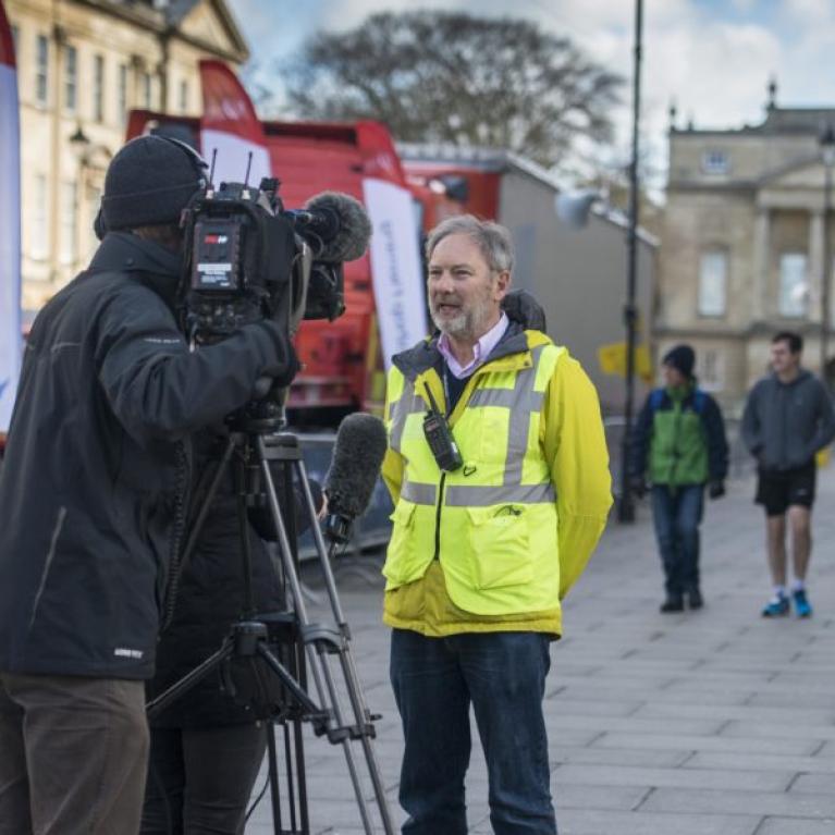 Marathon official being interviewed