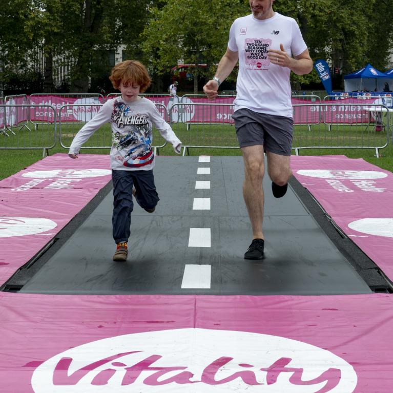 Man and boy running