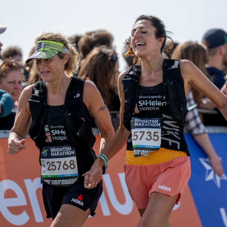 two women running