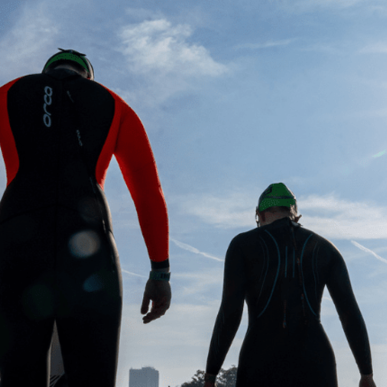 swimmers entering the serpentine