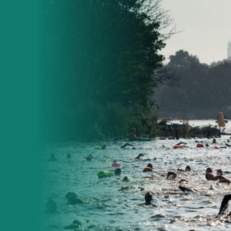 General view of swimmers in action at the Children With Cancer UK Swim Serpentine on Saturday 18th September 2021.