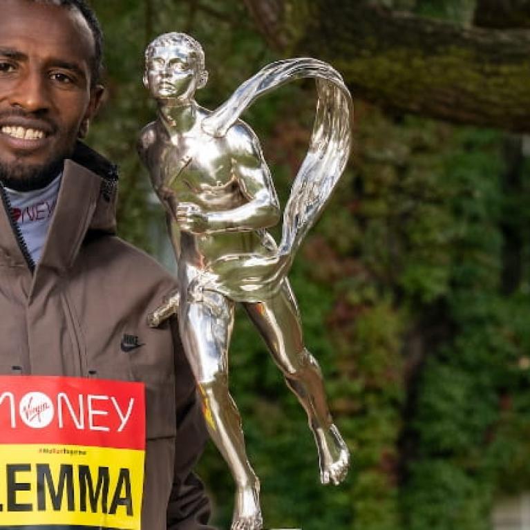 Sisay Lemma (ETH) poses with the Sporting Life Chris Brasher Trophy after winning the Elite Men’s Race at the 2021 TCS London Marathon