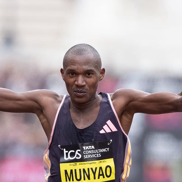 Munyao crossing the Finish Line