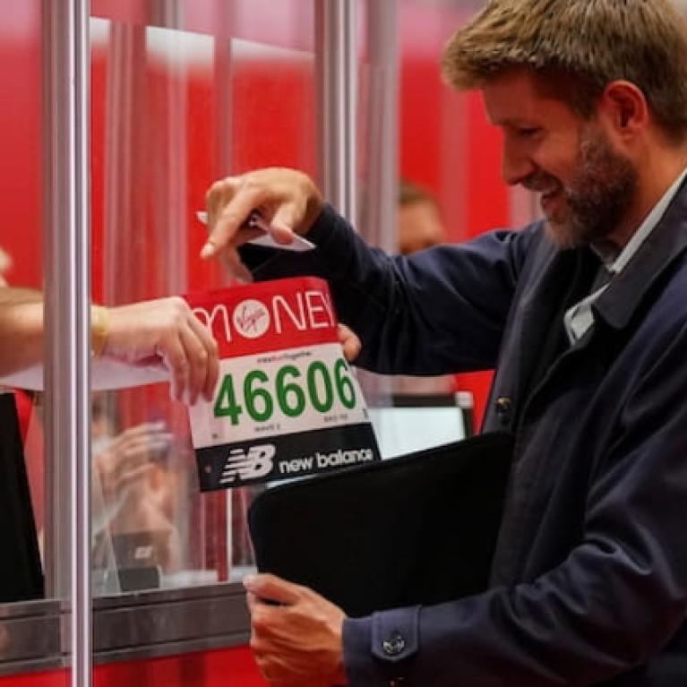 A participant registers for the 2021 Virgin Money London Marathon