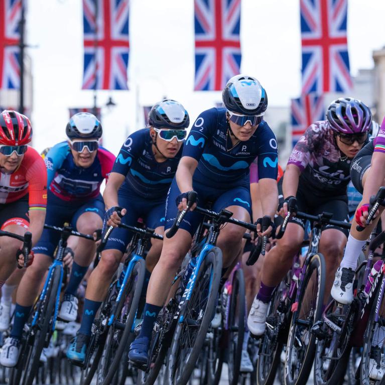 Pro riders in the peloton of the cycle along Piccadilly