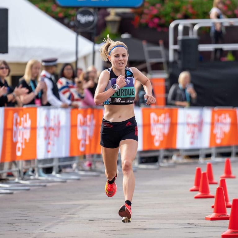 Charlotte Purdue near the Finish Line of The Big Half