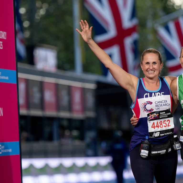 Two women at the Finish Line of the TCS London Marathon