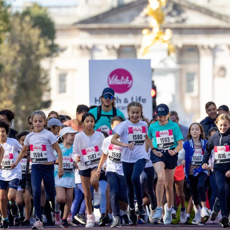 Young runners leave the 2023 Vitality Westminster Mile Start Line