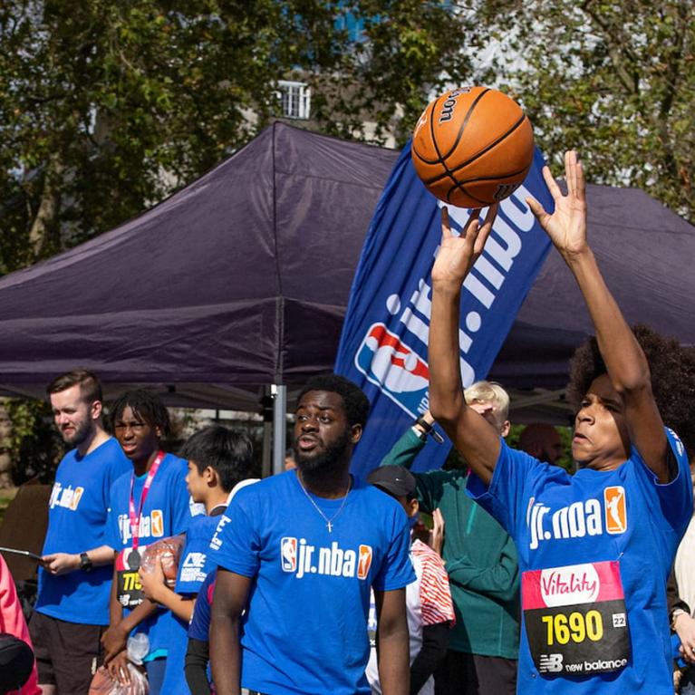 Child shooting a basketball