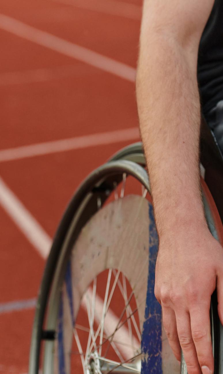 Hand on wheelchair rim