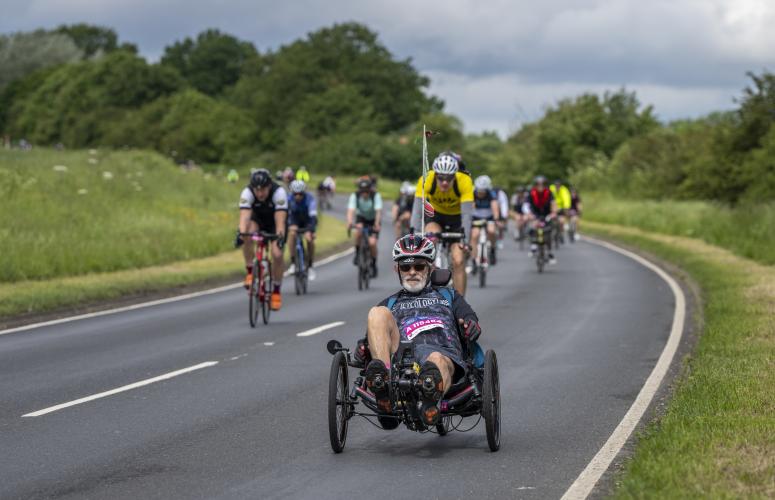 Man cycling an adaptive bike in the RideLondon event