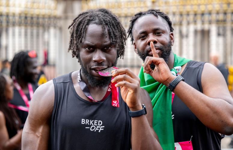 Runners from Brked Off Run Club pose for a photo with their medals after completing The Vitality London 10,000, Sunday 22nd September 2024.