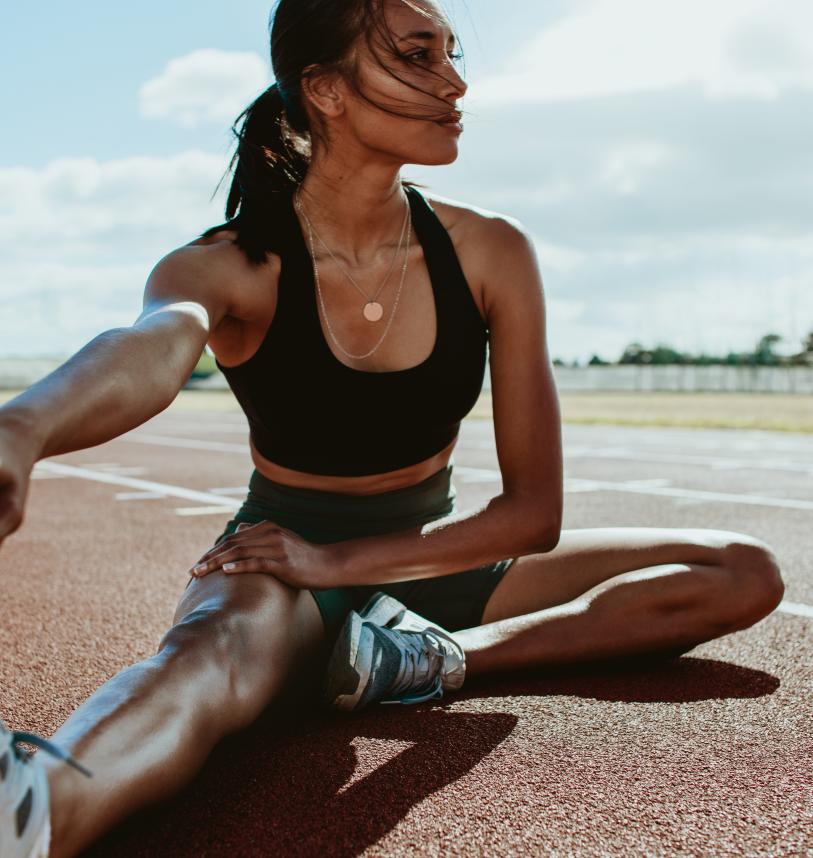 Runner stretches after their training run