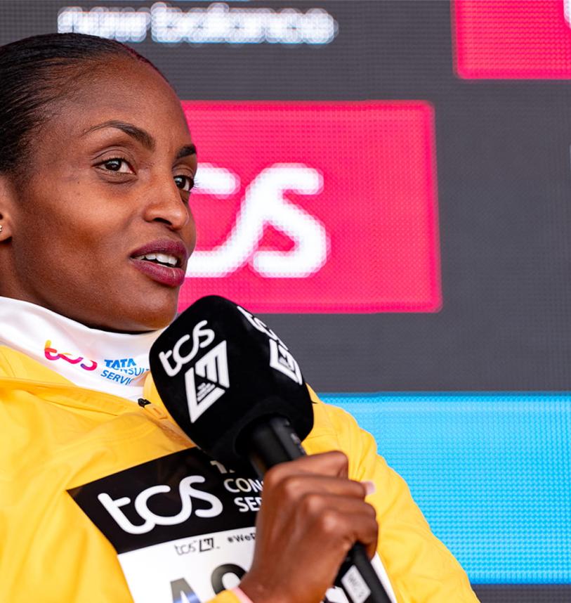 Tigst Assefa at the 2024 TCS London Marathon press conference