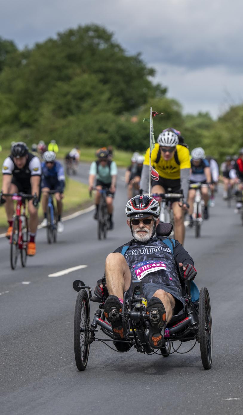 Man cycling an adaptive bike in the RideLondon event