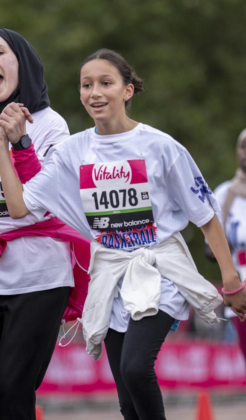 Participants celebrate their achievement at the Vitality Westminster Mile