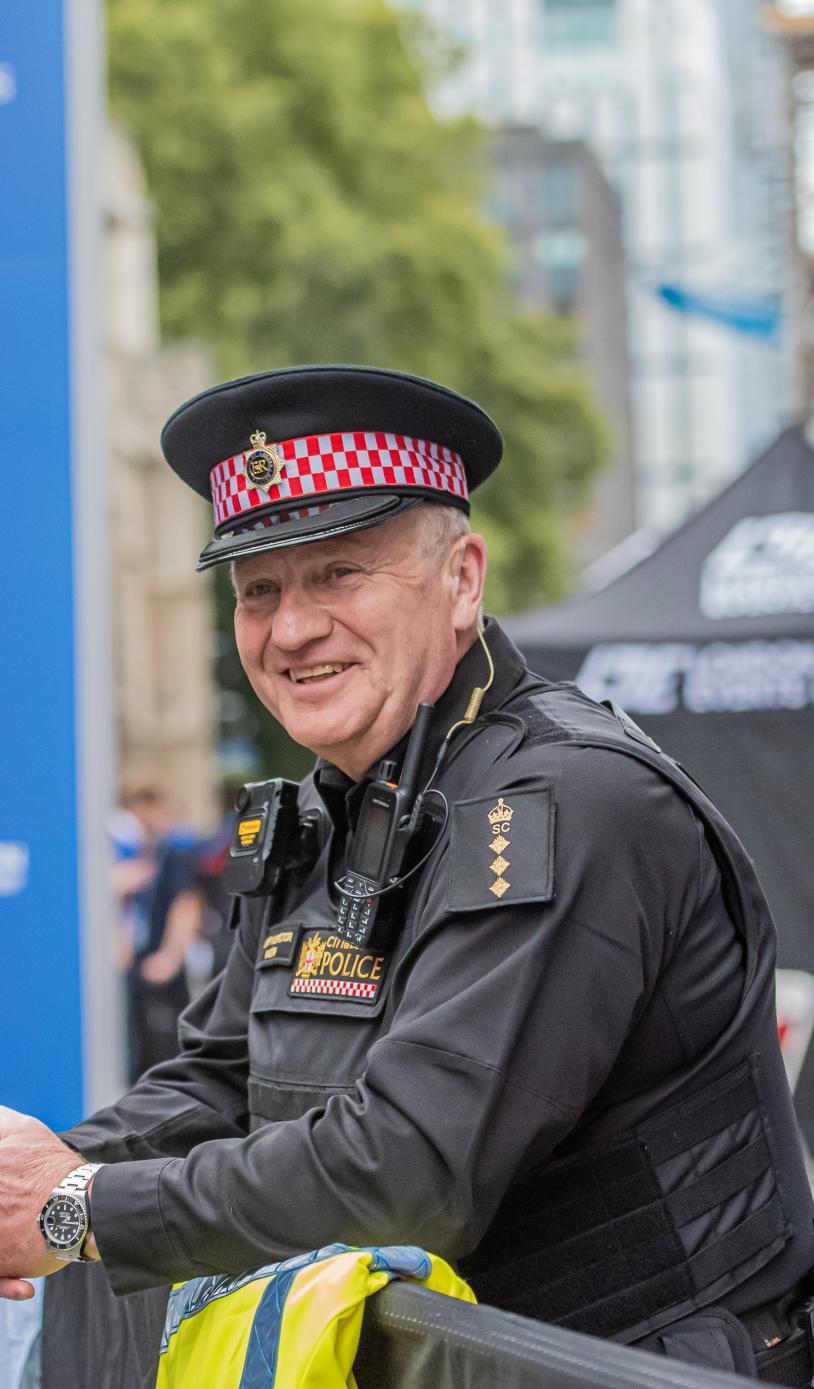 An officer stands by at the Great City Race