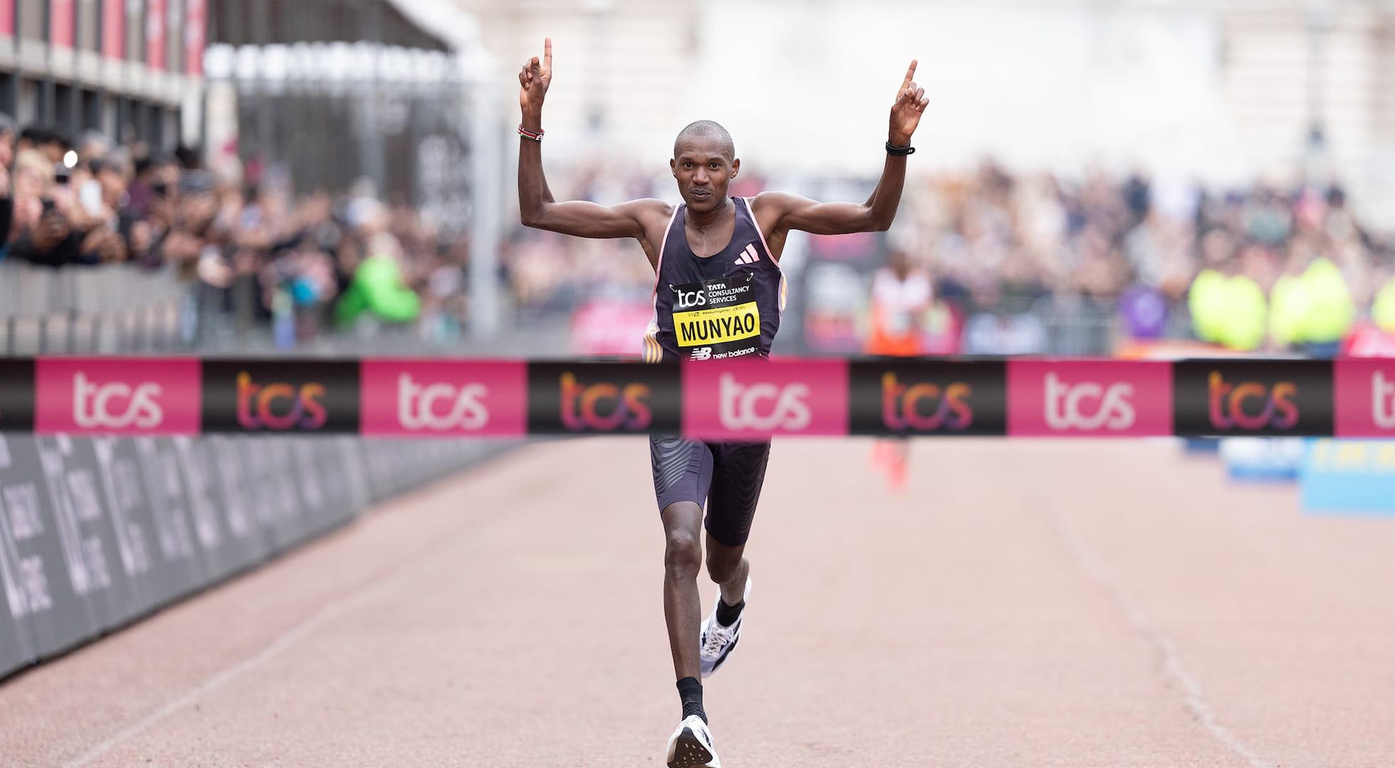 Alexander Mutiso Munyao (KEN) celebrates as he wins the Elite Men’s Race 